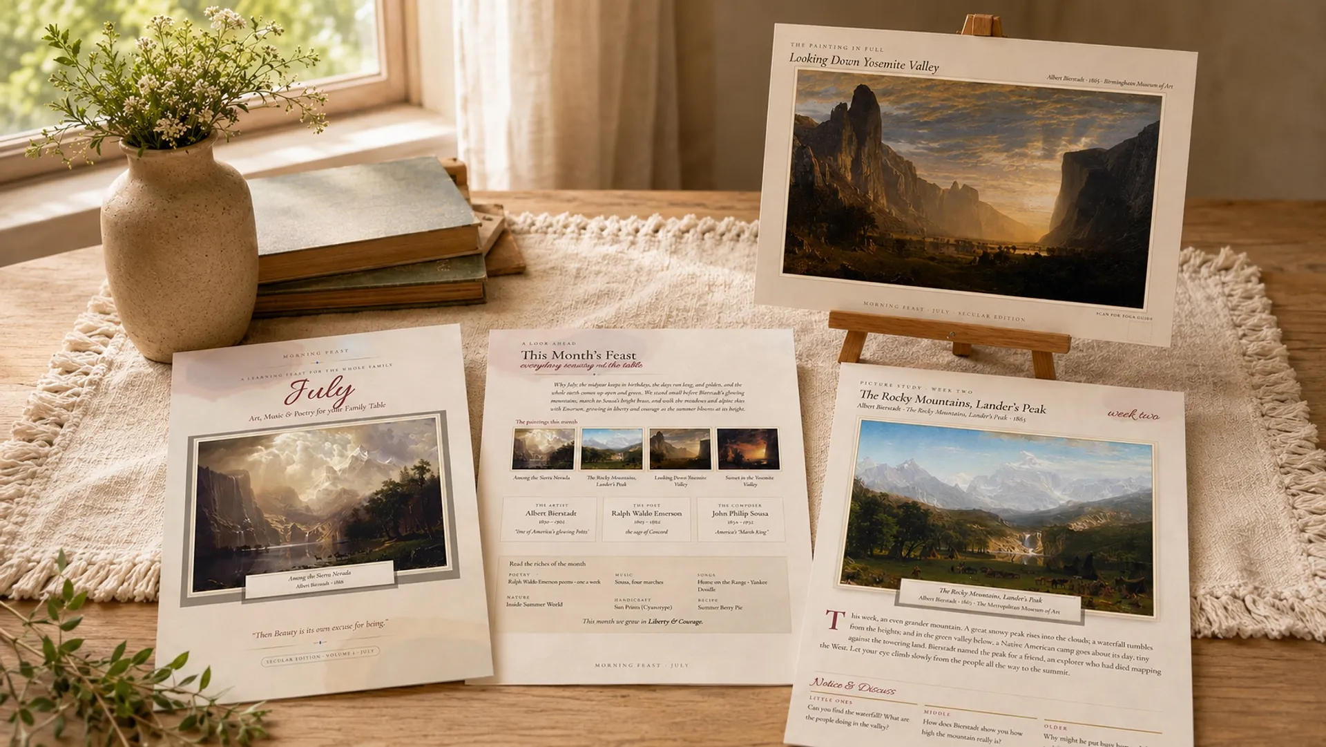Morning Feast bundle pages laid out on a table, featuring luminous landscape paintings